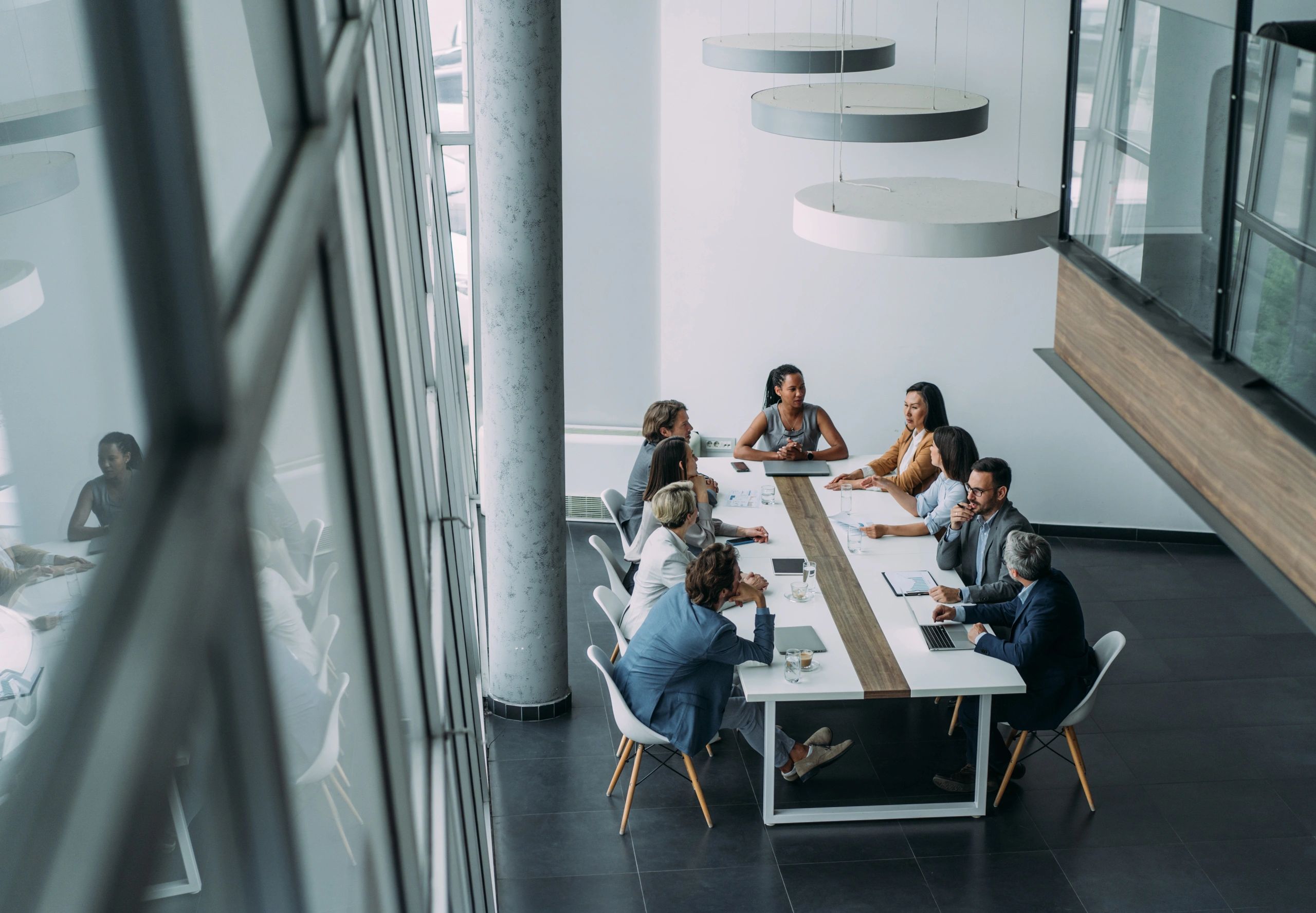 Business team collaborating around a meeting table