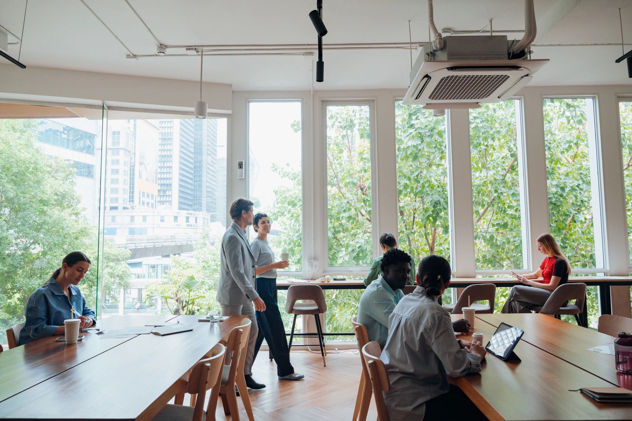 Professionals working together in a modern coworking office